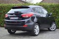 Hyundai ix35 - 1.6i GDI Active | Navi | stoelverwarming | PDC | Airco - 1 - Thumbnail