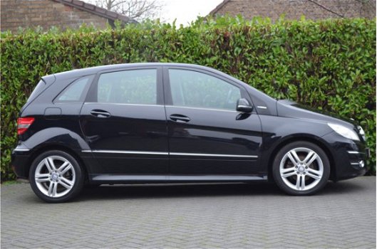 Mercedes-Benz B-klasse - 180 BlueEFFICIENCY Ambition Sport | PDC | stoelverwarming | Cruise control - 1