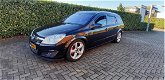 Opel Astra Wagon - 1.9 CDTi Cosmo 150pk NAP Halfleder Clima Xenon - 1 - Thumbnail