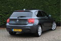 BMW 1-serie - 118i High Executive M-Pakket | Lederen bekleding | Schuif\kantel dak | Stoelverwarming - 1 - Thumbnail