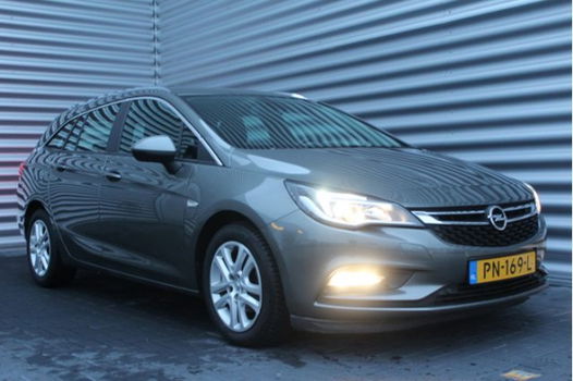 Opel Astra Sports Tourer - 1.6 CDTI 110PK BUSINESS+ / NAVI / XENON / CLIMA / LED / AGR / PDC / BLUET - 1