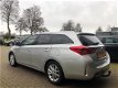 Toyota Auris Touring Sports - 1.8 Hybrid Lease+ Navi, Stoelverwarming, Trekhaak - 1 - Thumbnail