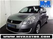 Suzuki Swift - 1.2 Comfort - 1 - Thumbnail