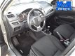 Suzuki Swift - 1.2 Comfort - 1 - Thumbnail