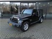 Jeep Wrangler Unlimited - 2.8 CRD SAHARA 200pk, Leer, Navi, Ecc, Cruise, Stoelverw - 1 - Thumbnail