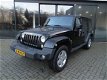 Jeep Wrangler Unlimited - 2.8 CRD SAHARA 200pk, Leer, Navi, Ecc, Cruise, Stoelverw - 1 - Thumbnail