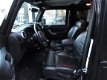 Jeep Wrangler Unlimited - 2.8 CRD SAHARA 200pk, Leer, Navi, Ecc, Cruise, Stoelverw - 1 - Thumbnail