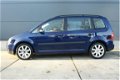 Volkswagen Touran - 1.6-16V FSI Athene AIRCO, RADIO/CD - 1 - Thumbnail