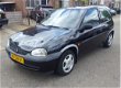 Opel Corsa - 1.4i-16V Strada NIEUWE APK - NAP - STUURBEKRA - 1 - Thumbnail