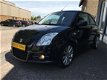 Suzuki Swift - 125 pk / CLIMATE/ KEYLESS/ STOELVERWARMING/ NIEUWE APK - 1 - Thumbnail