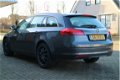 Opel Insignia Sports Tourer - 1.8 Edition Zeer Goed Onderhouden - 1 - Thumbnail