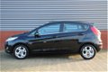 Ford Fiesta - 1.25 Titanium 82 PK | Cruise Control | verwarmde voorruit | LMV | Parkeersensoren acht - 1 - Thumbnail