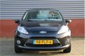 Ford Fiesta - 1.25 Titanium 82 PK | Cruise Control | verwarmde voorruit | LMV | Parkeersensoren acht - 1 - Thumbnail