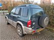 Suzuki Grand Vitara - 2.0 TDi Grijs Kenteken APK tm 31-05-2020 - 1 - Thumbnail