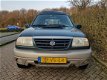 Suzuki Grand Vitara - 2.0 TDi Grijs Kenteken APK tm 31-05-2020 - 1 - Thumbnail