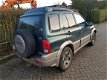 Suzuki Grand Vitara - 2.0 TDi Grijs Kenteken APK tm 31-05-2020 - 1 - Thumbnail