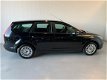 Ford Focus Wagon - 1.6 Titanium Navigatie PDC Climate - 1 - Thumbnail