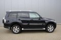 Mitsubishi Pajero - 3.2 DI-D Intense LWB AUT/ Org NL - 1 - Thumbnail