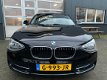 BMW 1-serie - 114i Business+ |schuifdak|achter camera|sport| - 1 - Thumbnail