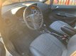 Opel Corsa - 1.4 16v Cosmo Automaat Navi, Airco, Stuur+stoelverwarming - 1 - Thumbnail