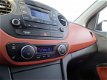Hyundai i10 - 1.2 i-Motion Premium Keyless / Climate / BT carkit / Cruise - 1 - Thumbnail