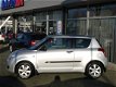 Suzuki Swift - 1.3 BASE 100% DEALER ONDERHOUDEN NL-AUTO RADIO/AUX - 1 - Thumbnail