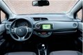 Toyota Yaris - 1.3 VVT-i 100pk 6-bak 5-drs Dynamic | Navi | Camera | Cruise | Trekhaak - 1 - Thumbnail