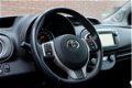 Toyota Yaris - 1.3 VVT-i 100pk 6-bak 5-drs Dynamic | Navi | Camera | Cruise | Trekhaak - 1 - Thumbnail