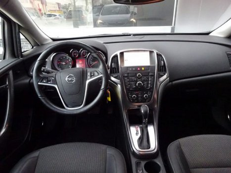Opel Astra Sports Tourer - 1.4 TURBO SPORT | AUTOMAAT | NAVIGATIE | STUURVERW. | HALF-LEER | ALL-IN - 1