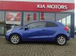 Kia Rio - 1.2 CVVT 85pk 3D Plus Pack * LAGE KM STAND - 1 - Thumbnail