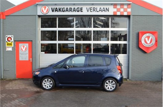 Mitsubishi Colt - 1.1 Edition Two trekhaak afneembaar *Winterbanden aanwezig - 1