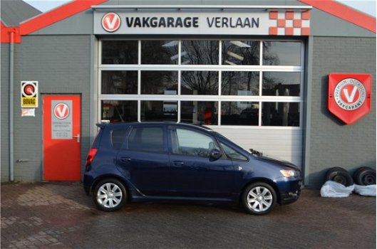 Mitsubishi Colt - 1.1 Edition Two trekhaak afneembaar *Winterbanden aanwezig - 1