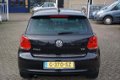 Volkswagen Polo - 1.2 TSI Highline automaat, clima, xenon, pdc, navi - 1 - Thumbnail