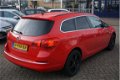 Opel Astra Sports Tourer - 1.4 Turbo Sport + xenon, stoelverw., trekhaak, navi, zeer nette auto - 1 - Thumbnail