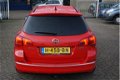 Opel Astra Sports Tourer - 1.4 Turbo Sport + xenon, stoelverw., trekhaak, navi, zeer nette auto - 1 - Thumbnail