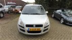 Suzuki Splash - 1.2 Comfort airco, lm-velgen, cv, automaat - 1 - Thumbnail