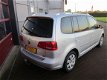 Volkswagen Touran - 1.2 TSI Comfortl. BM 7p. 6 MND BOVAG GAR/ECC/TREKHAAK/STOELVERW - 1 - Thumbnail