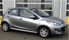 Mazda 2 - 2 1.3 BIFUEL GT-M Line 1250 euro btw, stoelverwarming, airco, lichtmetalen velgen, mistlam - 1 - Thumbnail