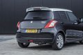 Suzuki Swift - 1.2 S-Edition EASSS +CRUISE+AIRCO+16INCH - 1 - Thumbnail