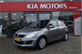 Suzuki Swift - 1.3i-16V DDiS Comfort 5-Drs Airco Navigatie Bluetooth Trekhaak Stoelverwarming - 1 - Thumbnail