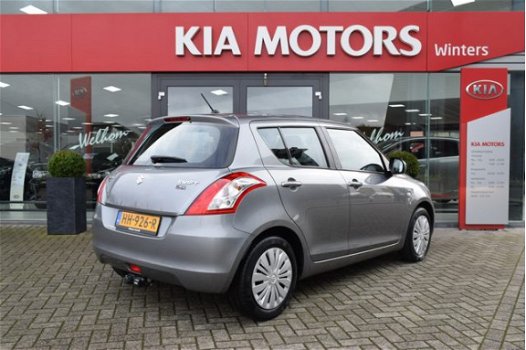 Suzuki Swift - 1.3i-16V DDiS Comfort 5-Drs Airco Navigatie Bluetooth Trekhaak Stoelverwarming - 1