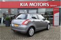 Suzuki Swift - 1.3i-16V DDiS Comfort 5-Drs Airco Navigatie Bluetooth Trekhaak Stoelverwarming - 1 - Thumbnail