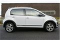 Volkswagen Up! - 1.0 TSI BMT cross up |clima |white-silver |cruisecontrol |135pk |stoelverwarming | - 1 - Thumbnail