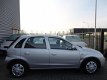 Opel Corsa - 1.2-16V Enjoy 5 deurs, nwe APK, AIRCO, 4 nwe banden, 183.387 km en rijd nog super - 1 - Thumbnail