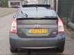 Toyota Prius - 1.8 Executive PANO/ LEER/ RADAR CC/ LED - 1 - Thumbnail