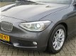 BMW 1-serie - 114i EDE Executive /5-DRS/AIRCO/XENON/NAVI/NAP - 1 - Thumbnail