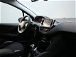 Peugeot 208 - 1.2 82 pk Style Pack Navigatie | Clima | Parkeersensoren - 1 - Thumbnail