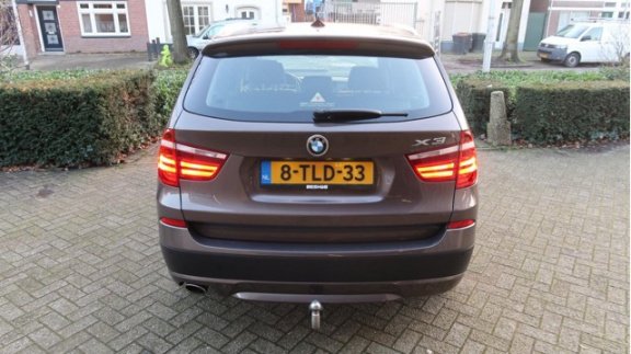 BMW X3 - SDrive18d AUTOMAAT/LEER/NAVI/TREKHAAK/NAP - 1