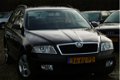 Skoda Octavia Combi - 1.9 TDI Ambiente M.2006 ZWART NAP/AIRCO - 1 - Thumbnail