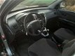 Hyundai Tucson - - 2.0i Active NIEUWE APK + goed onderhouden - 1 - Thumbnail